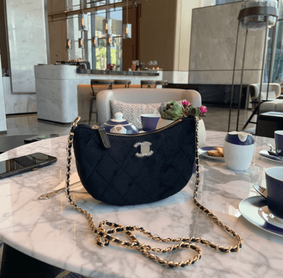 black bag with gold hardware