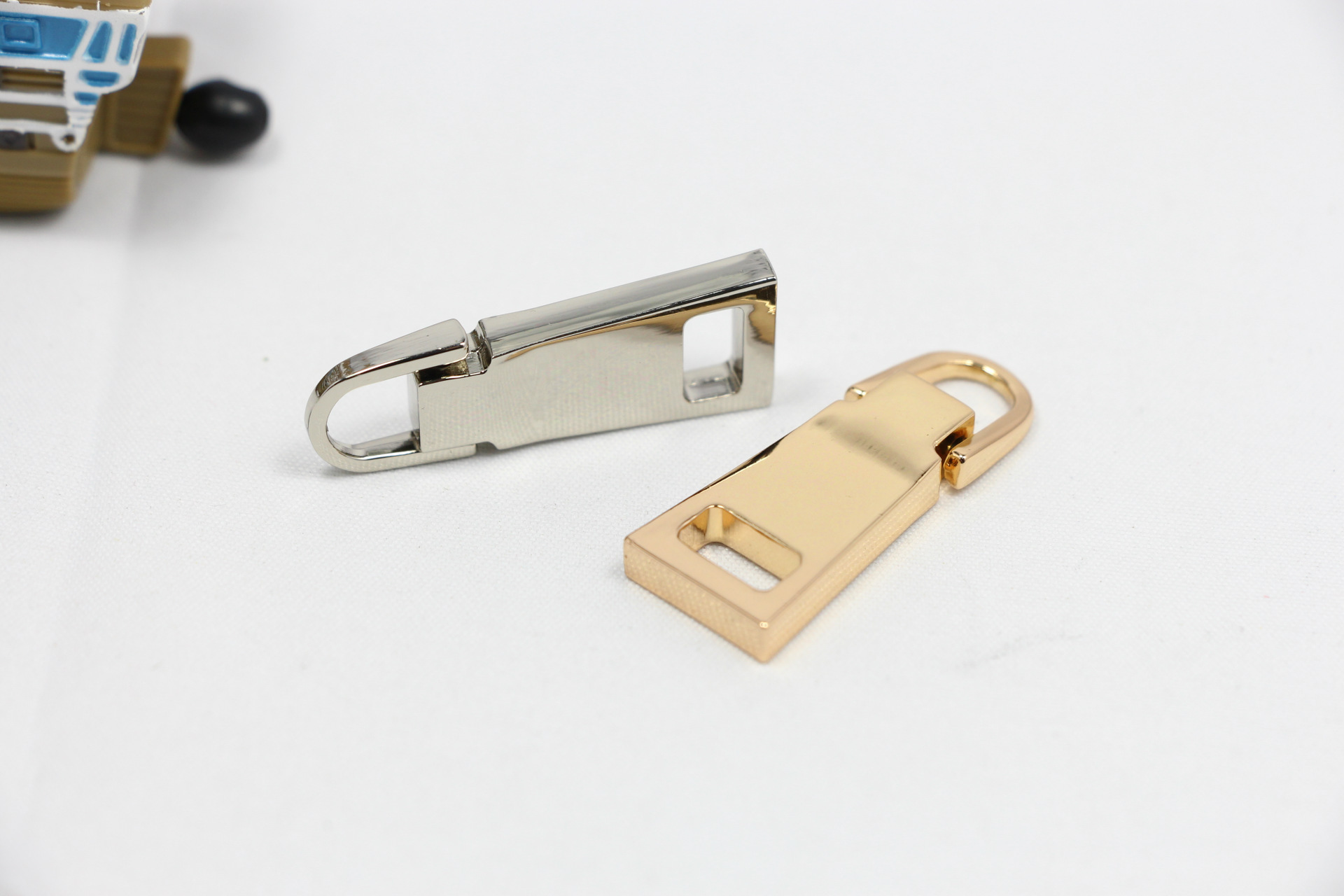 Zipper pull tab Zipper pull tab